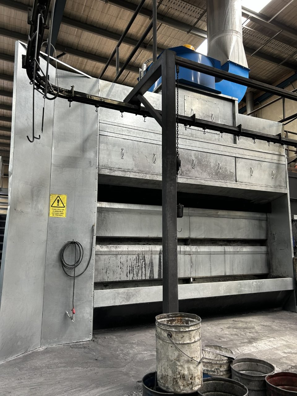 Powder coating booth cleaned back to bare metal by dry ice blasting